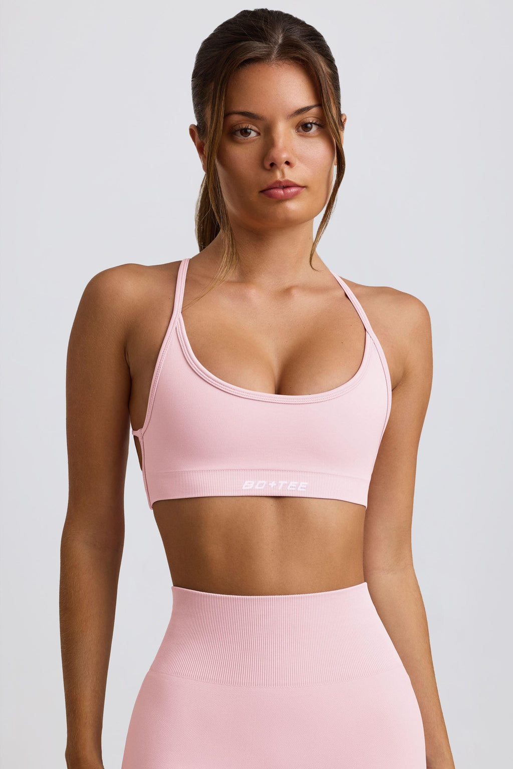 เสื้อสปอร์ตบราไร้รอยต่อ Super Sculpt สีชมพูผงสีชมพู