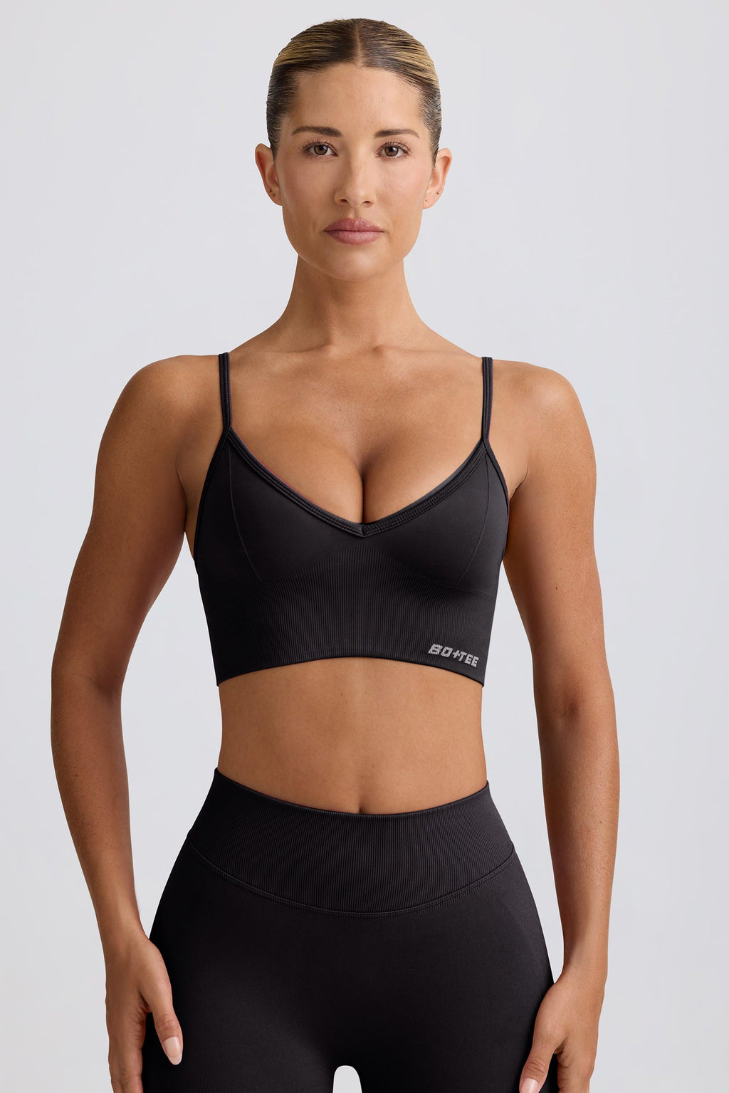 Define Luxe V-neck Sports Bra In Black