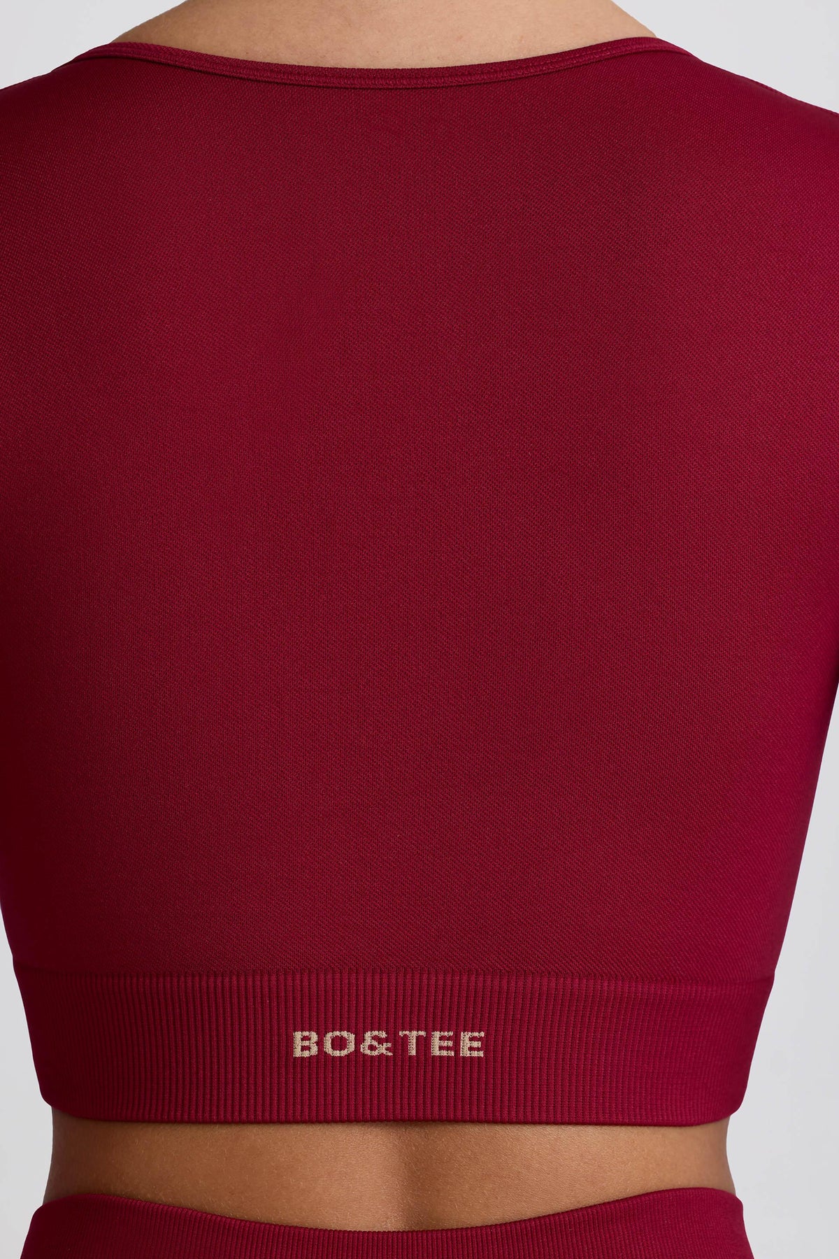 เสื้อครอปท็อปแขนยาวไร้รอยต่อ Super Sculpt สีเบอร์กันดี