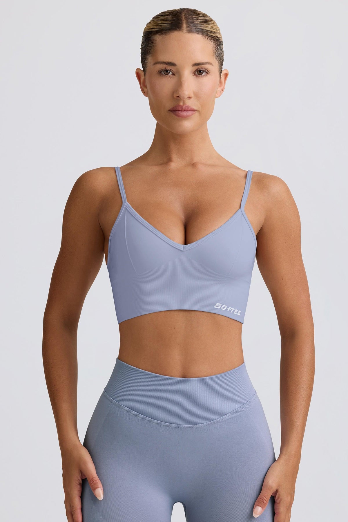 Define Luxe V-neck Sports Bra In Blue Grey