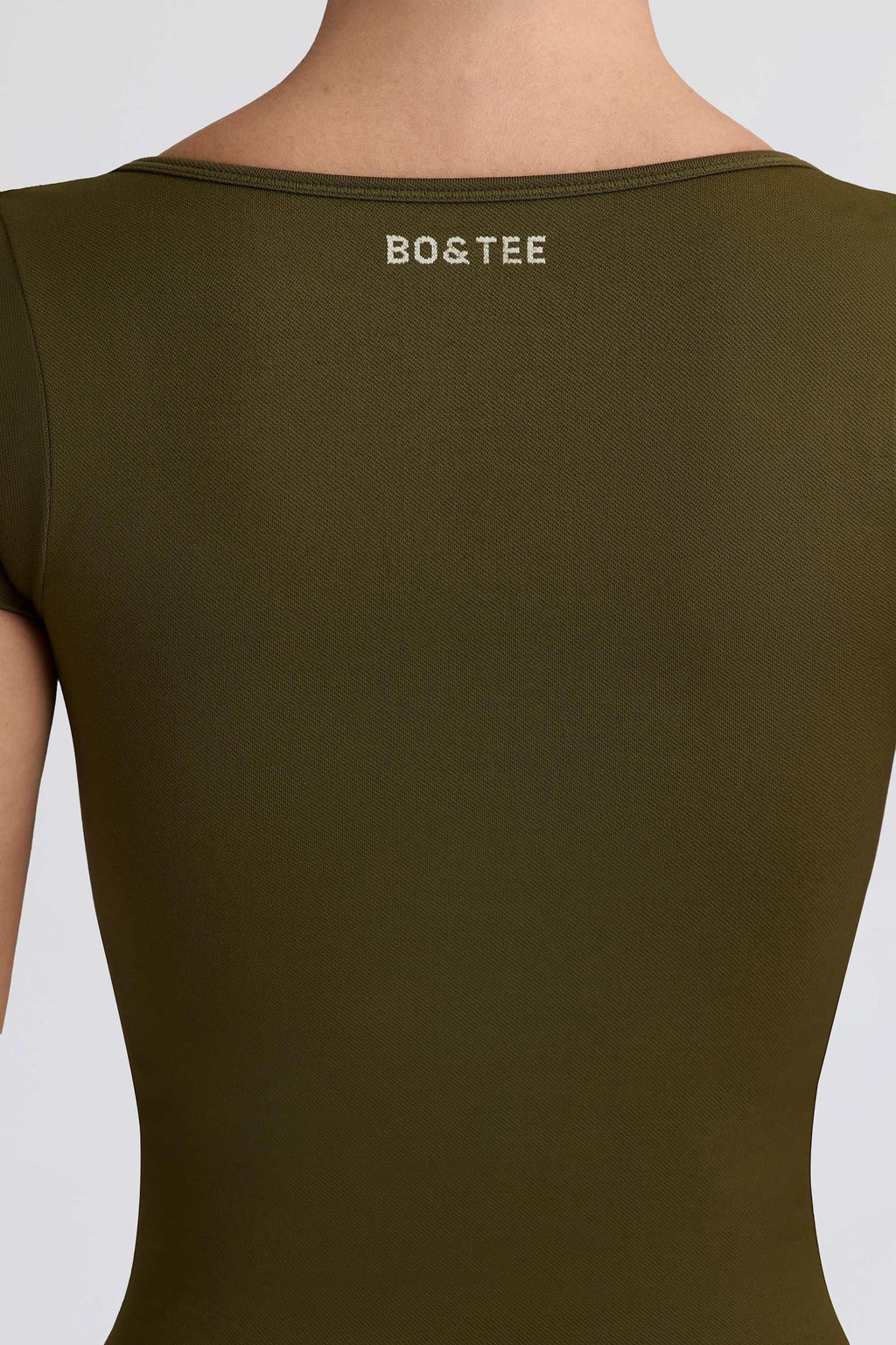เสื้อยืดไม่มีรอยต่อ Super Sculpt สีเขียวเข้ม