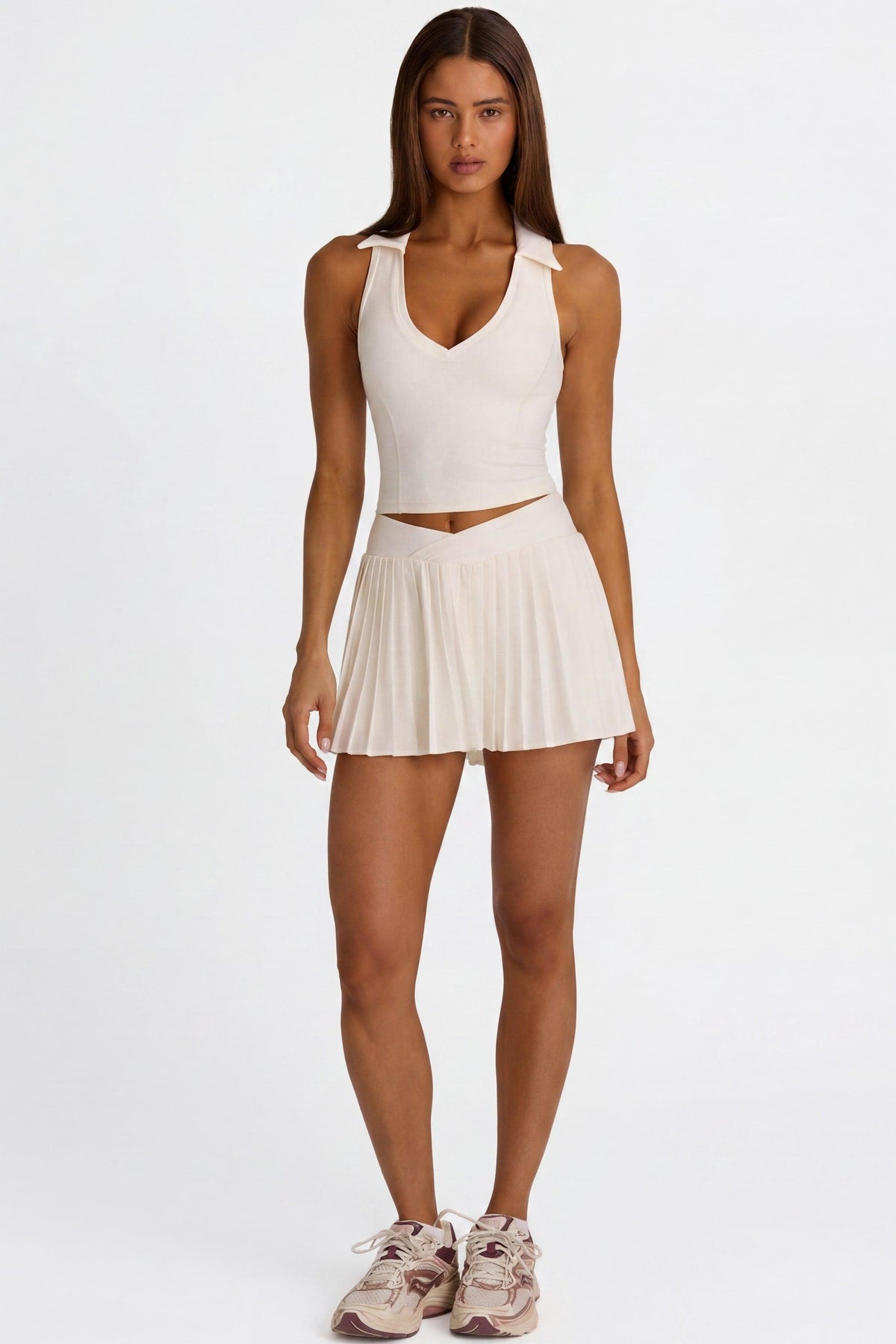 Soft Active Crossover Pleated Mini Skort In Coconut
