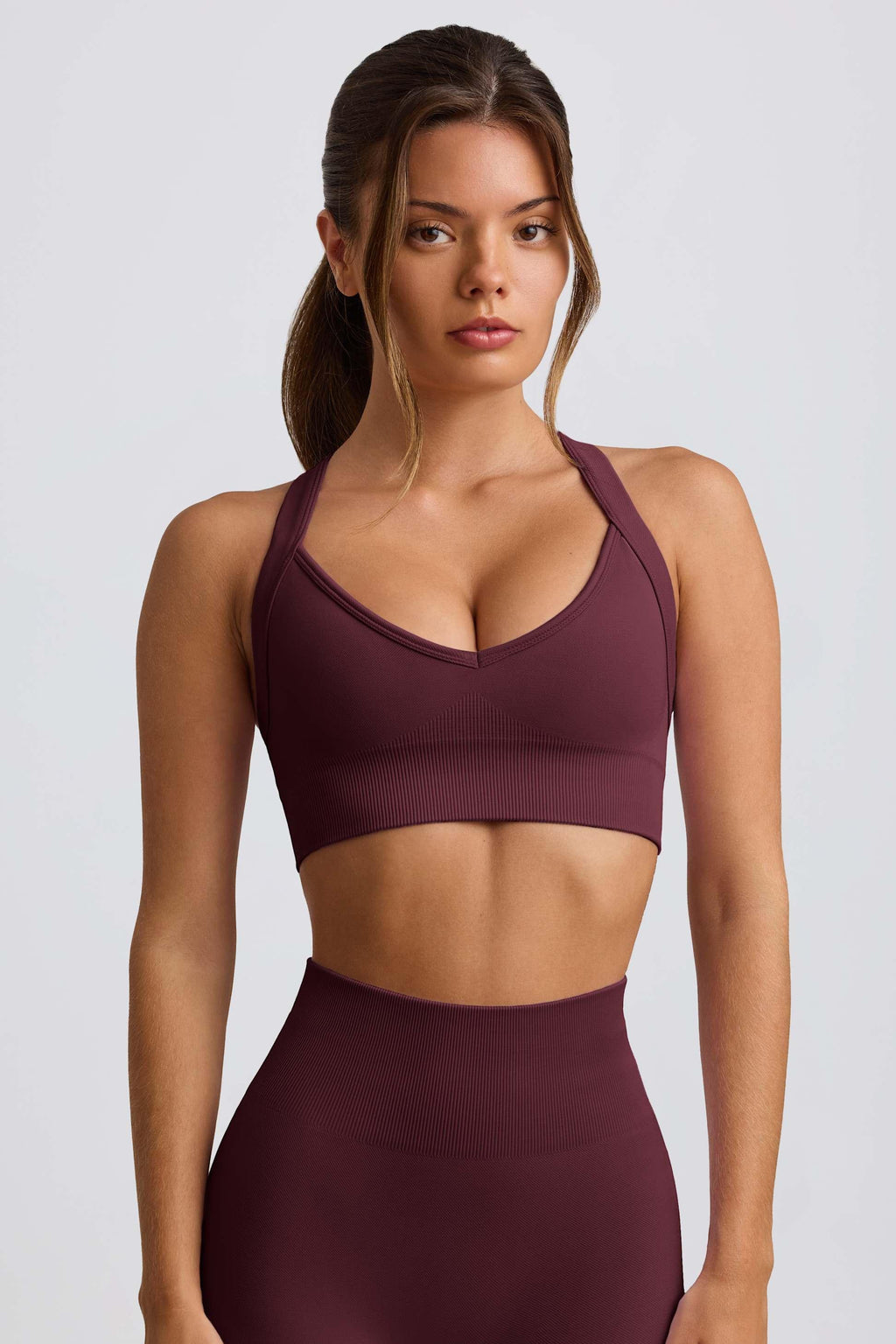 Super Sculpt Seamless Crossback Sports Bra In Burgundy