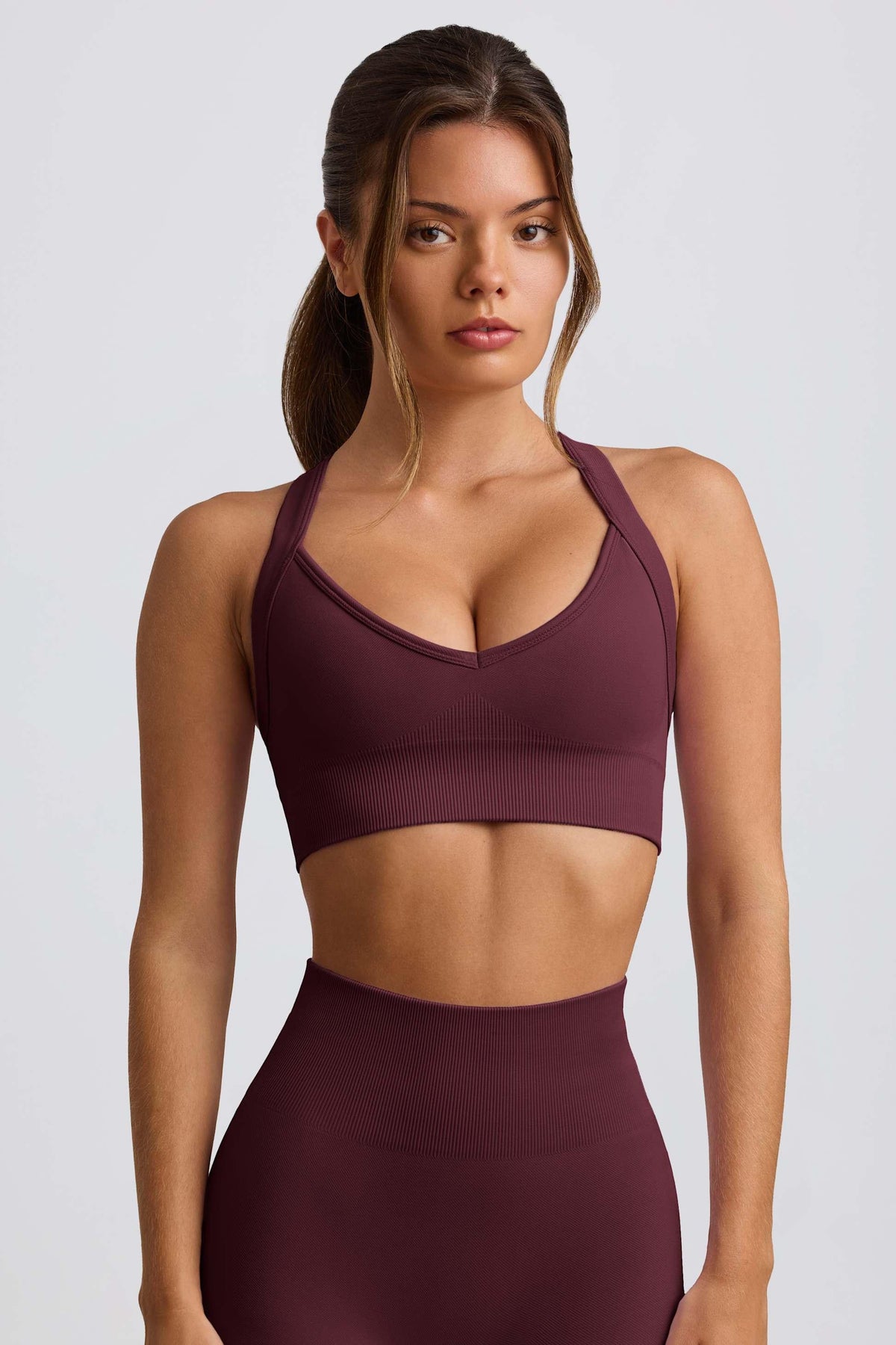 Super Sculpt Seamless Crossback Sports Bra In Burgundy