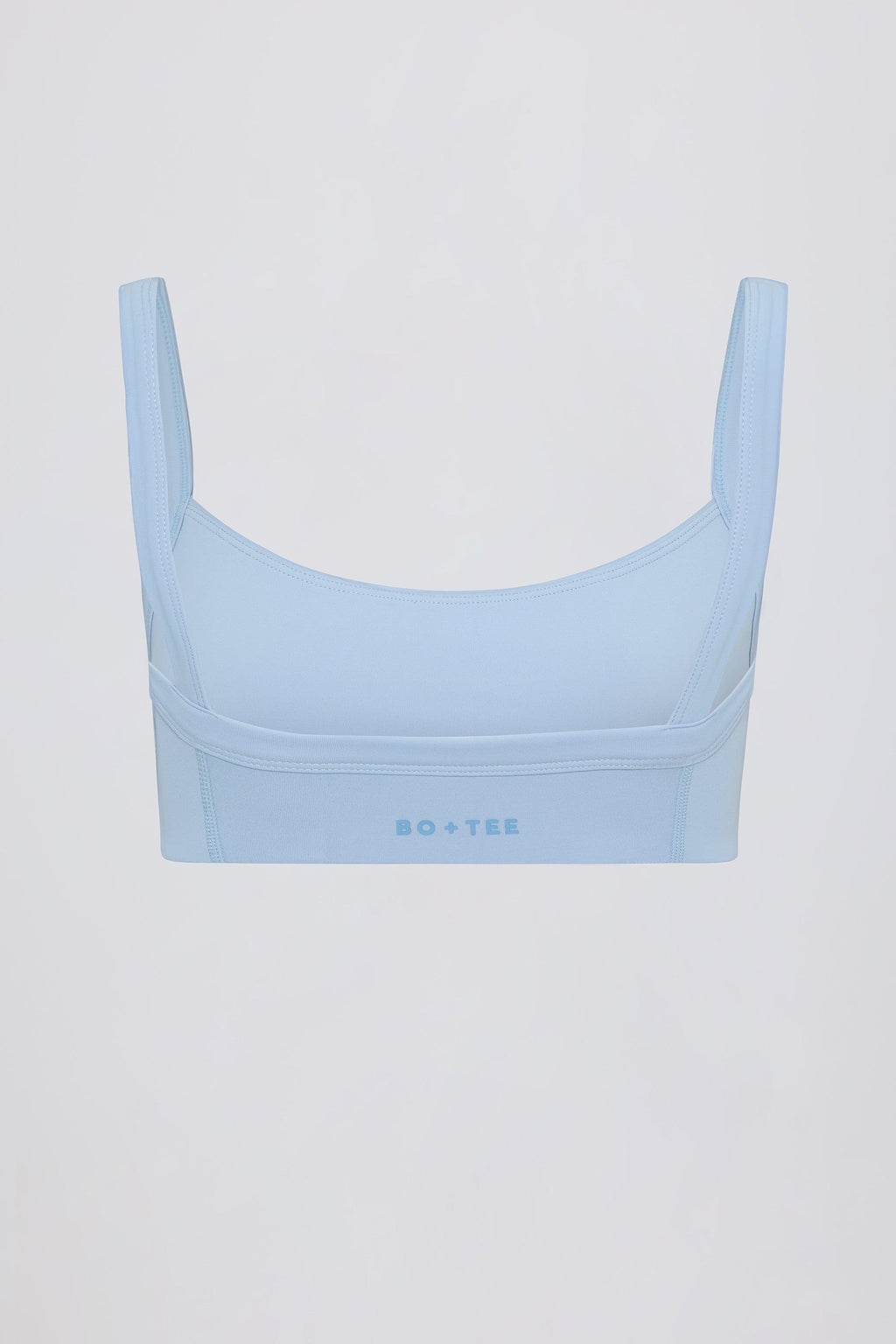 เสื้อสปอร์ตบราแบบนุ่มแอคทีฟพร้อมดีเทล ใน Sky