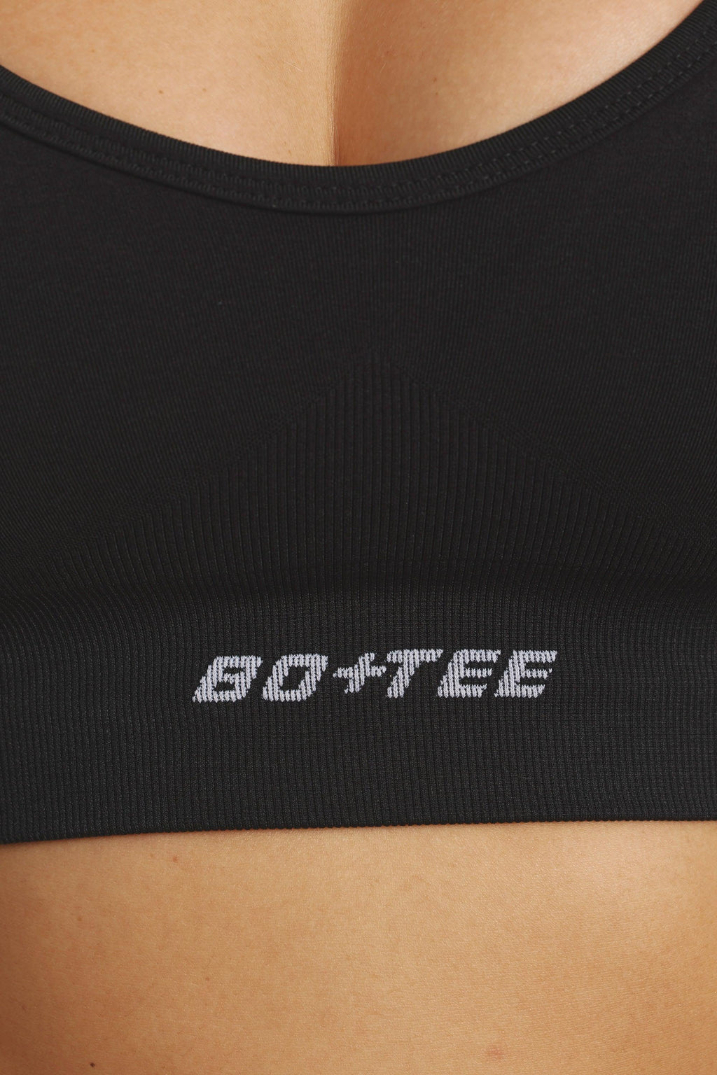 Plunge Neck Define Luxe Sports Bra In Black